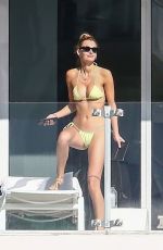 ROOSMARIJN DE KOK in Bikini Ssunbathing on Her Balcony in Miami 04/02/2020