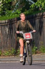 SAMANTHA WOMACK Out Riding Bike in London 04/24/2020