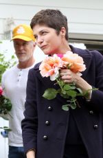 SELMA BLAIR Smells the Roses Outside Her Home 04/18/2020