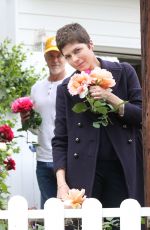 SELMA BLAIR Smells the Roses Outside Her Home 04/18/2020
