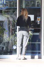 TORI PRAVER Wearing Masks and Gloves at a Post Office in Beverly Hills 03/31/2020
