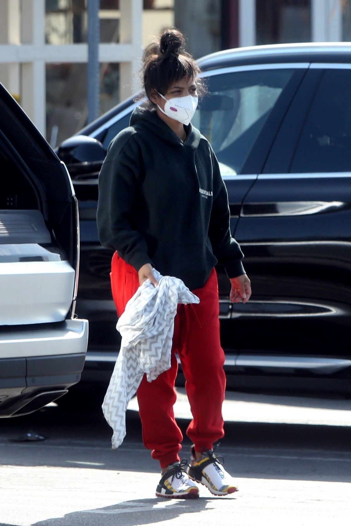 CHRISTINA MILIAN Wearing Mask Out Shopping in Los Angeles 04/04/2020 ...