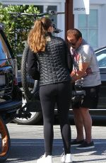 CHRISTINA SCHWARZENEGGER Helps Her Father Aarnold Loading a Bike 05/19/2020