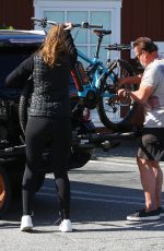 CHRISTINA SCHWARZENEGGER Helps Her Father Aarnold Loading a Bike 05/19/2020