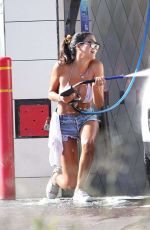 CJ FRANCO in Denim SHorts and Bikini Top Out Washing Her Car in Santa Monica 05/02/2020