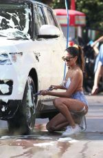 CJ FRANCO in Denim SHorts and Bikini Top Out Washing Her Car in Santa Monica 05/02/2020
