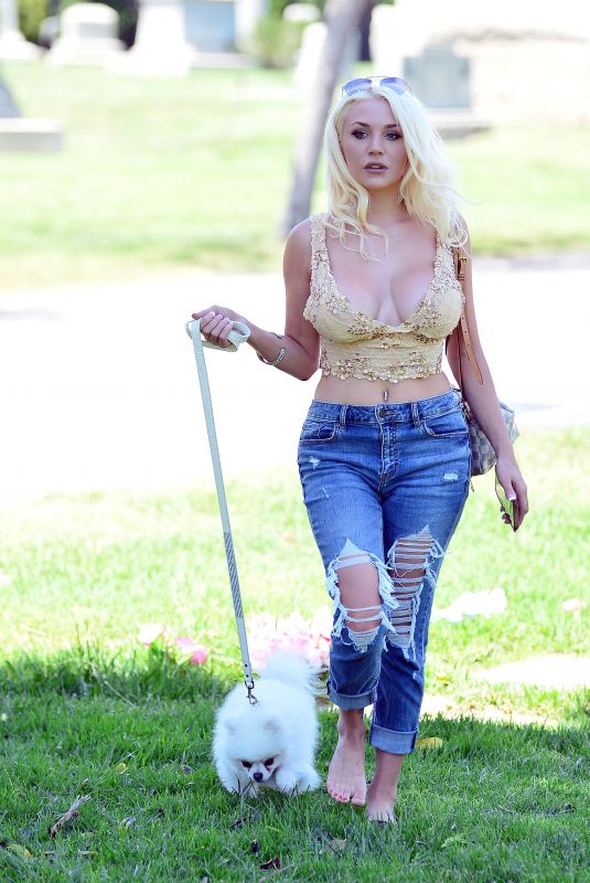 COURTNEY STODDEN in Ripped Denim Out with Her Dog at a Park in Beverly Hills 05/07/2020