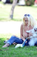 COURTNEY STODDEN in Ripped Denim Out with Her Dog at a Park in Beverly Hills 05/07/2020