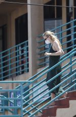 DAKOTA FANNING Moving Stuff in Los Angeles 05/07/2020