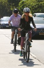 GOLDIE HAWN and Kurt Russel Out Riding Bikes in Brentwood 05/10/2020