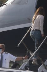 JENNIFER LOPEZ and Alex Rodriguez Boarding on a Private Jet in Miami 05/29/2020