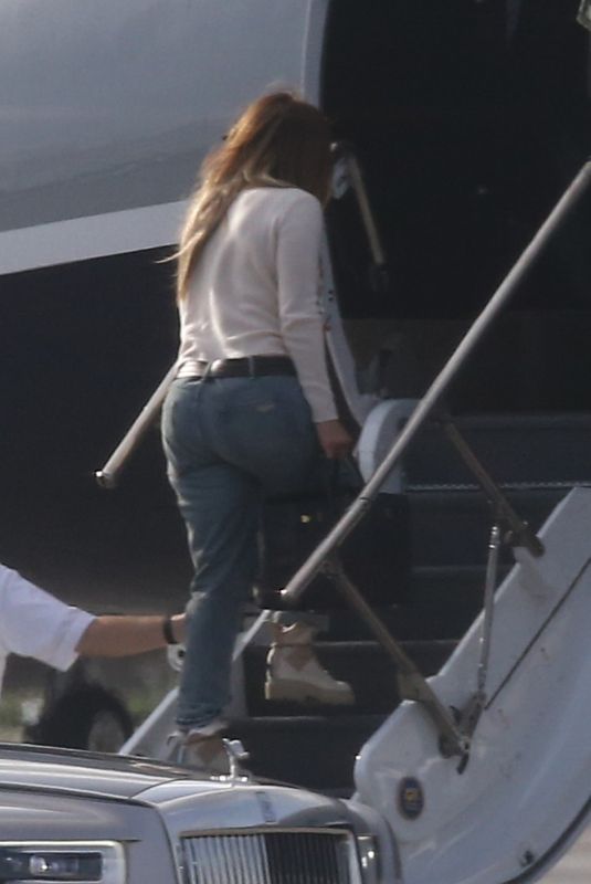 JENNIFER LOPEZ and Alex Rodriguez Boarding on a Private Jet in Miami 05/29/2020