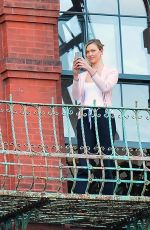 KARLIE KLOSS and Joshua Kushner Kissing on Their Balcony in New York 05/14/2020