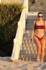 KIM KARDASHIAN in Bikini Out at a Beah in Malibu 05/05/2020