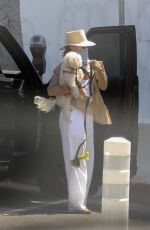 KRISTIN CHENOWETH Wears a Mask Out with Her Dog in West Hollywood 05/16/2020
