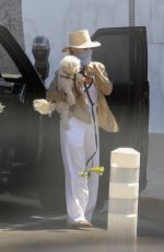 KRISTIN CHENOWETH Wears a Mask Out with Her Dog in West Hollywood 05/16/2020