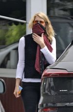 LAURA DERN Uses a Scarf as Mask at Brentwood Country Mart 04/30/2020
