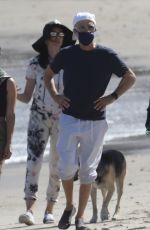 LIBERT RISS and Jimmy Iovine Out with Their Dog on the Beach in Malibu 05/07/2020