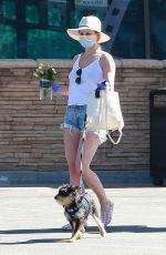 LILI REINHART in Denim Cut Off Out with Her Dog in Los Angeles 05/02/2020