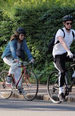 LILY JAMES Out Riding a Bike in London 05/15/2020