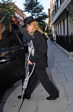 MADONNA Leaving a Hospital Supported by a Crutch in London 05/29/2020