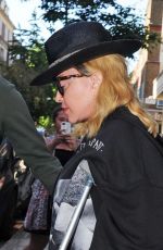 MADONNA Leaving a Hospital Supported by a Crutch in London 05/29/2020