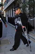 MADONNA Leaving a Hospital Supported by a Crutch in London 05/29/2020