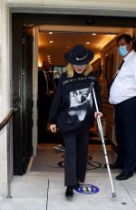 MADONNA Leaving a Hospital Supported by a Crutch in London 05/29/2020