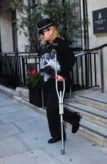 MADONNA Leaving a Hospital Supported by a Crutch in London 05/29/2020