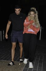 MOLLY MAE HAGUE and Tommy Fury Out with Their Dog in Manchester 05/28/2020