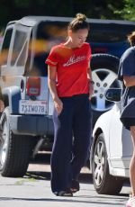 OLIVIA WILDE in a Fuzzy Slippers Out in Los Angeles 05/19/2020