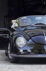 RACHEL ZOE and Rodger Berman Cruise in a Vintage Porsche Roadster 05/24/2020