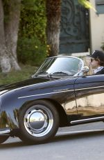 RACHEL ZOE and Rodger Berman Cruise in a Vintage Porsche Roadster 05/24/2020