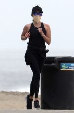 REESE WITHERSPOON Out Jogging on the Beach in Malibu 05/10/2020