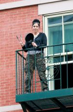 SARAH SILVERMAN on Her Fire Escape in New York 05/28/2020