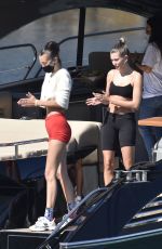 BELLA HADID and HAILEY BIEBER in Bikins at a Boat in Italy 06/23/2020