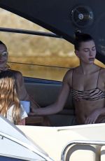 BELLA HADID and HAILEY BIEBER in Bikins at a Boat in Italy 06/23/2020