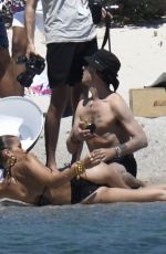 BELLA HADID in Bikini on the Set of a Photoshoot at a Beach 06/24/2020