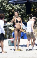 BELLA HADID in Bikini on the Set of a Photoshoot at a Beach 06/24/2020
