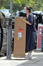 CHARLI XCX Xarries a Large Cardboard Box Out in Los Angeles 06/25/2020