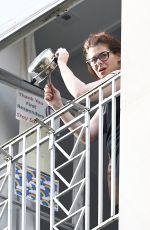 DEBRA MESSING Cheering First Responders from Her Balcony in New York 06/15/2020
