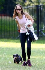 EMILIA CLARKE Out with Her Dog at a Park in London 06/23/2020