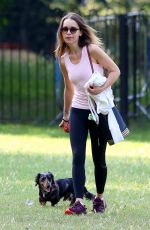 EMILIA CLARKE Out with Her Dog at a Park in London 06/23/2020