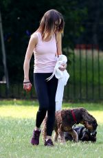 EMILIA CLARKE Out with Her Dog at a Park in London 06/23/2020