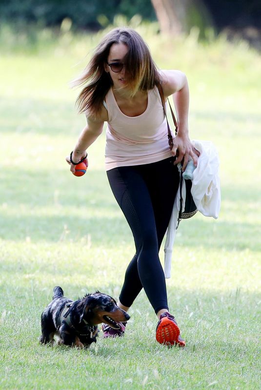 EMILIA CLARKE Out with Her Dog at a Park in London 06/23/2020