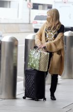 EMMA ROBERTS and Garrett Hedlund at LAX Airport in Los Angeles 06/26/2020