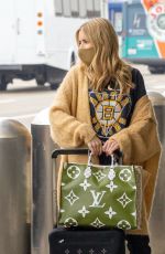 EMMA ROBERTS and Garrett Hedlund at LAX Airport in Los Angeles 06/26/2020