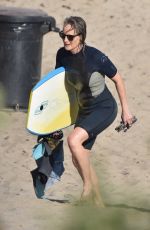 HELEN HUNT in Wetsuit at Bodyboarding Session in Malibu 06/26/2020