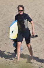 HELEN HUNT in Wetsuit at Bodyboarding Session in Malibu 06/26/2020