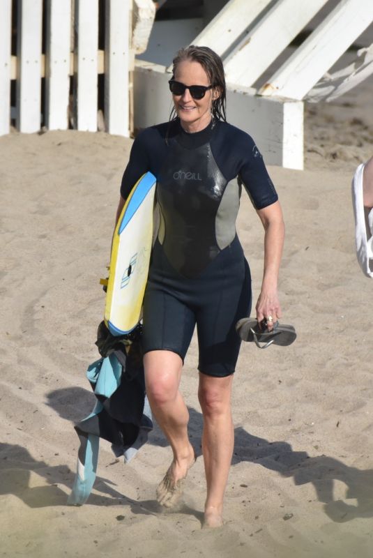 HELEN HUNT in Wetsuit at Bodyboarding Session in Malibu 06/26/2020